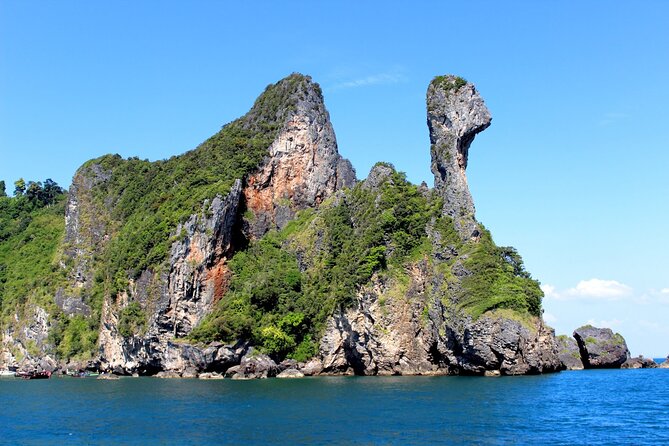 7 Islands Sunset Tour with Buffet Dinner & Night Snorkeling - Poda Island combines dinner with sunset