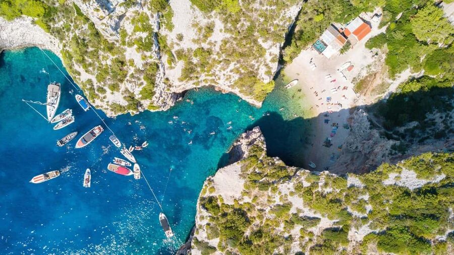 Adriatic Adventure: Blue Cave & 6 Islands Speedboat Escape - Komiža, a fishing town with time to slow down