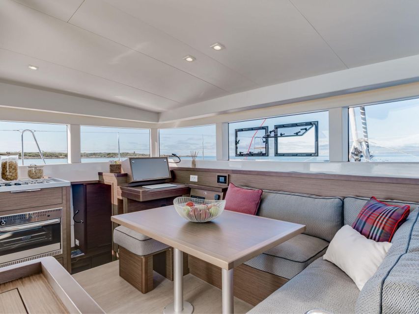 Archipelago di La Maddalena: Catamaran Tour Full day-Lunch - Meeting Game Sailing at the port
