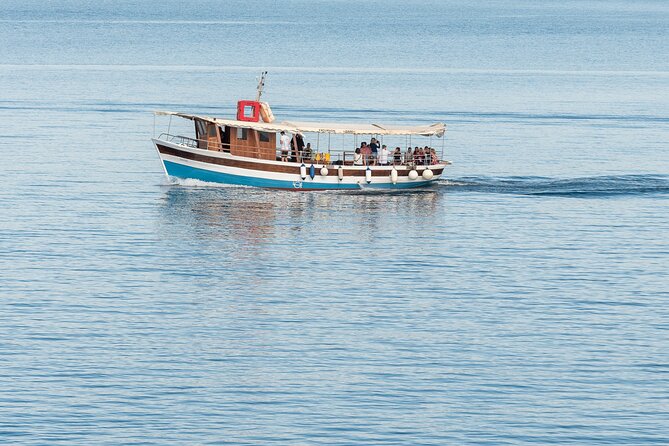 Blue Lagoon 3 Islands Tour with Lunch and Drinks Included - Maslinica on Šolta: a quieter hour among stone and sea