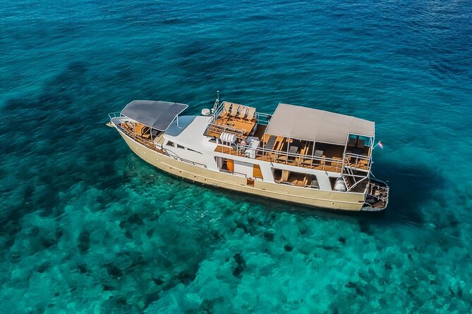 Blue Lagoon and 3 Island Boat Tour with Food and Drinks Included - Nečujam on Šolta and the wrecked ship