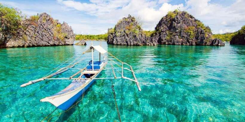 Coron: Coastal Cliffs, Beach & Malcapuya Island Hopping Tour - Seafood and local BBQ served by the water