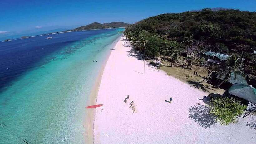 Coron: Complete Island Hopping Guided Tour with Lunch - Twin Lagoon gives you Coron’s strangest swim