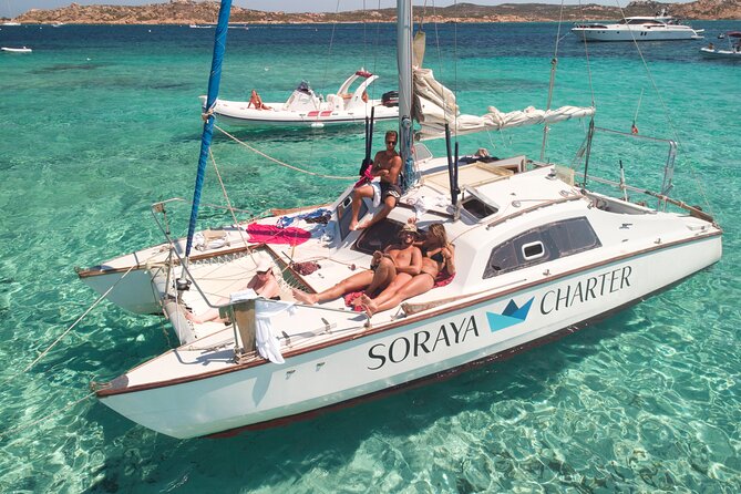 Daily cruise on a sailing catamaran on the La Maddalena archipelago - The First Stop: Swimming After the Morning Welcome
