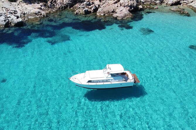 Day on a boat in the archipelago of La Maddalena with lunch - Spargi for another swim stop