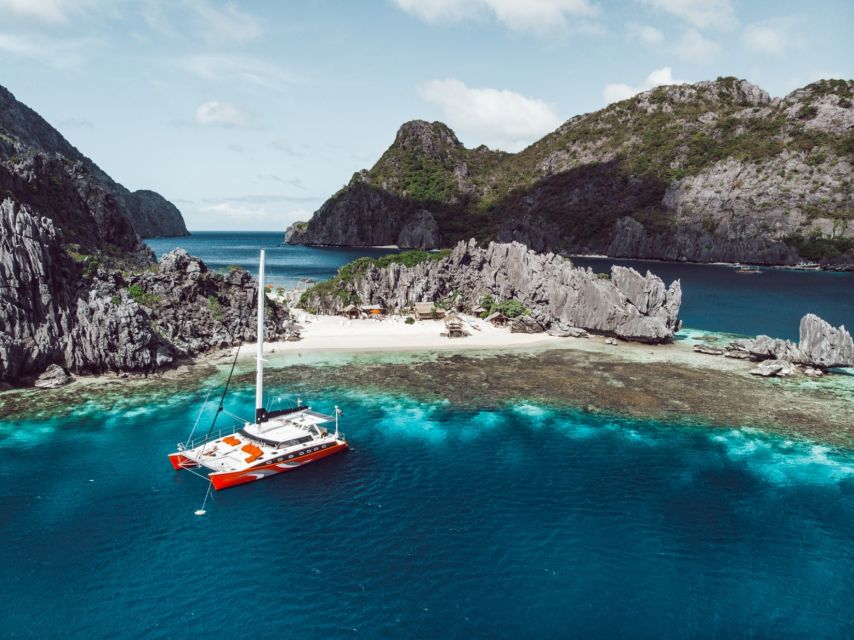 El Nido: Full-Day Premium Island Hopping Catamaran Cruise - Hidden Beach and Seven Commandos