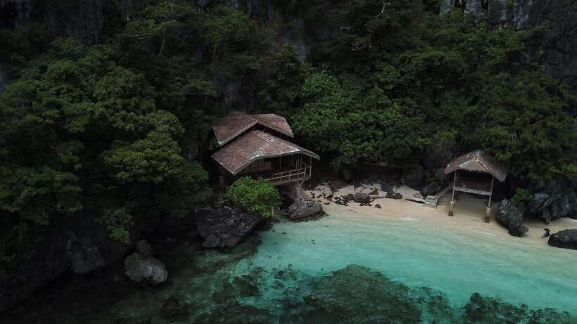 El Nido Private Tour A: Best Island Hopping - Secret Lagoon through the narrow rock opening