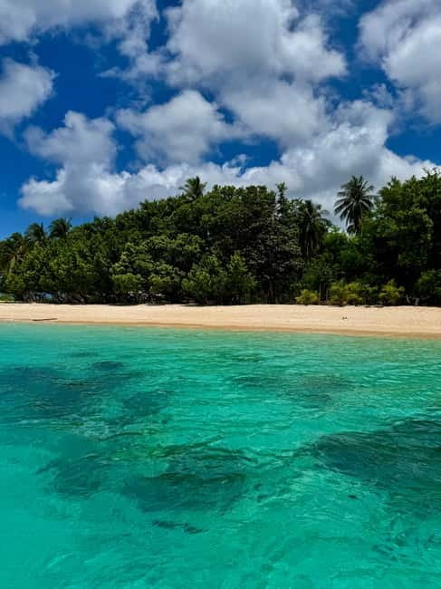 El Nido, Sibaltan: Private Snorkeling & Secret Islands Tour - A beach lunch that earns its place