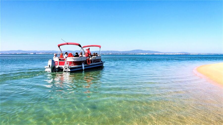 Faro: Ria Formosa Faro Islands Boat Tour - Leaving Faro through the park’s tidal channels