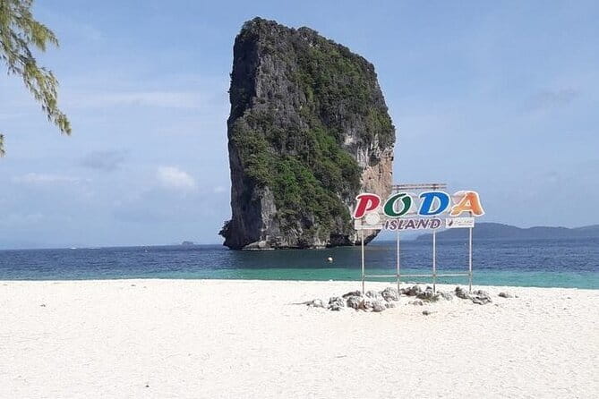 Four Islands Day Tour from Krabi - Phra Nang Cave Beach: rock, sand, and a famous spirit house