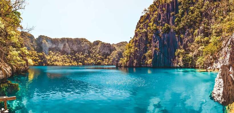 From Coron: Island Hopping Boat Day Trip with Buffet Lunch - Malcapuya Island adds a different kind of beach day