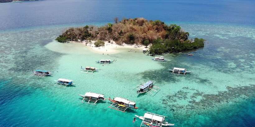 From Coron: Island Hopping Boat Day Trip with Buffet Lunch - CYC Beach, Sunset Beach, or Atwayan Beach