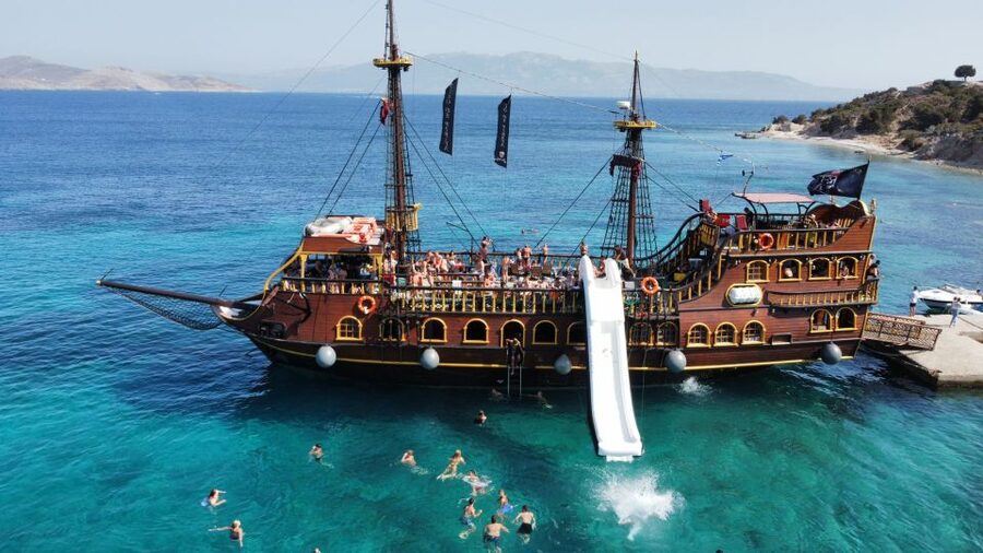 From Kos: 3-Island Pirate Cruise with Lunch and Waterslide - Music, drinks, and the social atmosphere