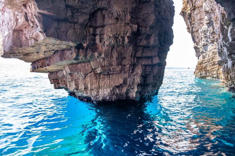 From Milna or Supetar: Magical Blue Cave Island Hopping - Entering the Blue Cave on Biševo