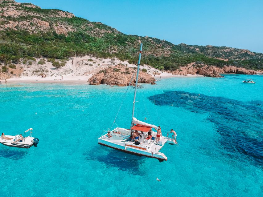 From Palau: La Maddalena Full-Day Archipelago Catamaran Tour - Coastal views toward Porto Rafael and Punta Sardinia
