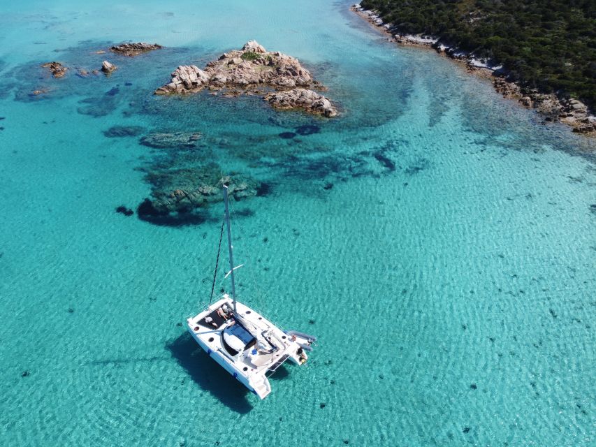 From Palau: Maddalena Archipelago Catamaran Tour with Lunch - Swimming and snorkeling in clear Sardinian water