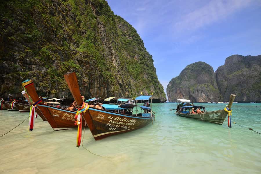 From Phi Phi: 6 Hrs Private Phi Phi Islands Boat Tour - Leaving Tonsai Bay and spotting monkeys