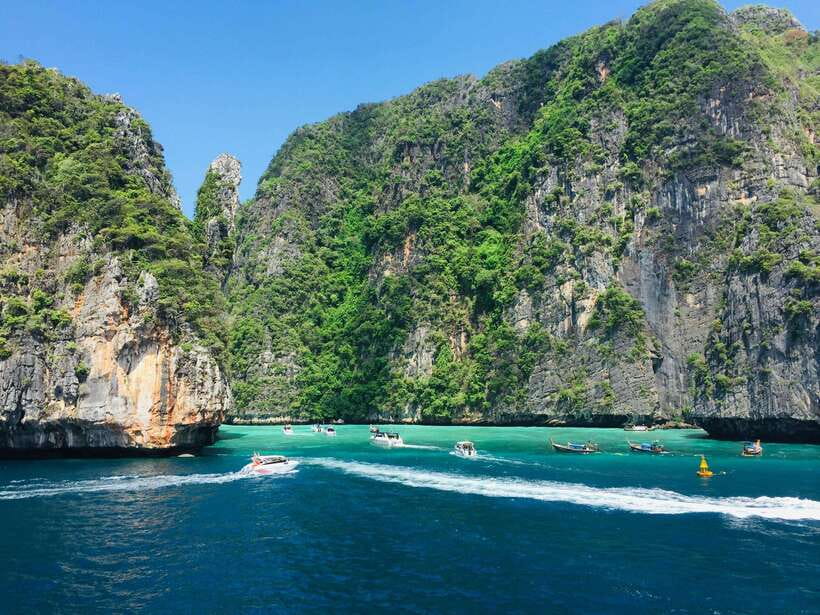 From Phi Phi: Full Day 7 Island Tour by Longtail with Sunset - A longtail day built around Phi Phi’s greatest hits