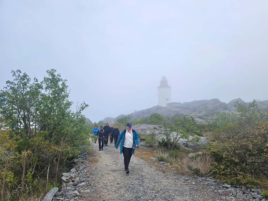 From Stockholm: Archipelago Hike to Landsort Lighthouse - Forest paths, rocky ground, and a natural pool