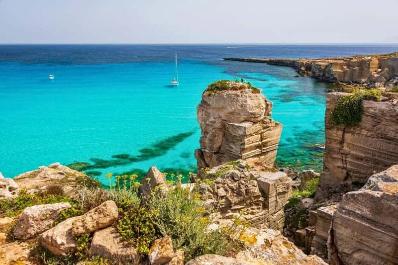 From Trapani: Egadi Islands Tour by Boat to Favignana and Levanzo with Lunch - Cala Azzurra begins the swimming day