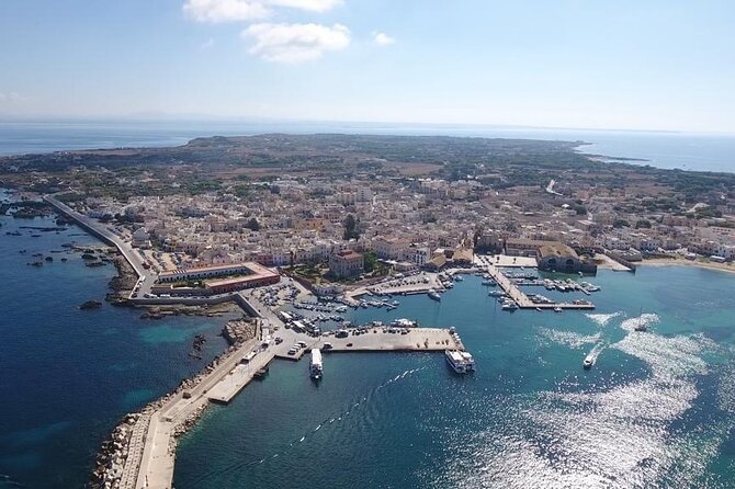 From Trapani: Egadi Islands tour with lunch on board - Favignana’s coves from the water