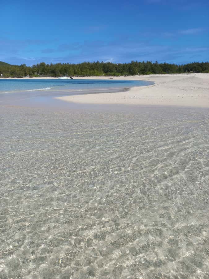 Grand Baie: Three Islands Private Boat Trip and Beach BBQ - Gabriel Island and the view toward Coin de Mire