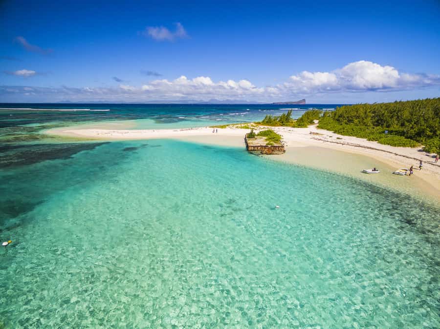 Grand Baie: Three Islands Private Boat Trip and Beach BBQ - A private speedboat from Grand Baie