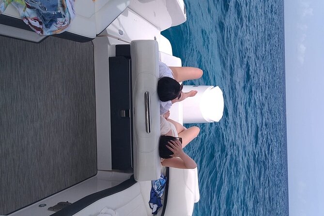 Half Day Snorkeling, Sightseeing & Island Hopping Private Charter - Cruising past Grace Bay Beach