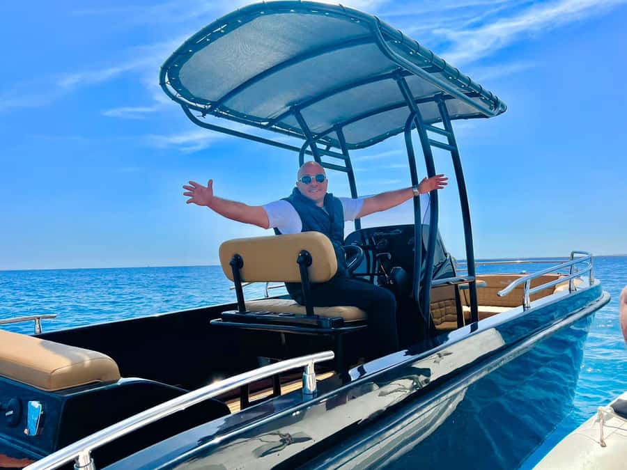 Hurghada: 4 Island Hopping Tour Dolphin, Snorkeling & Lunch - Orange Bay, the first hour on the sand