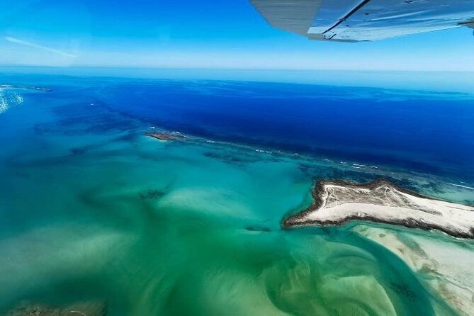 Incredible Islands Tour - Horizontal Falls & Cygnet Bay Pearl Farm - Beach time beneath Cape Leveque’s red cliffs