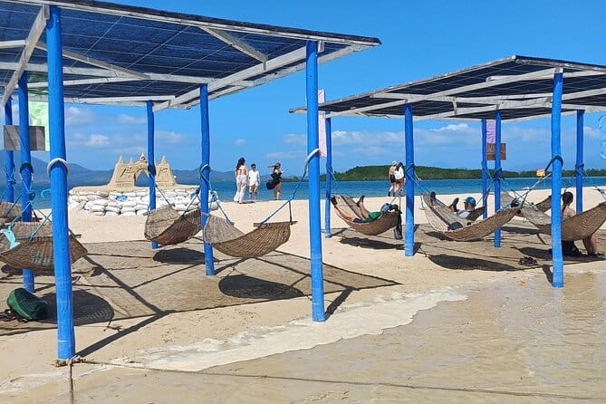 Joiners Honda Bay Island Hopping Tour - Cowrie Island: the beach base of the day
