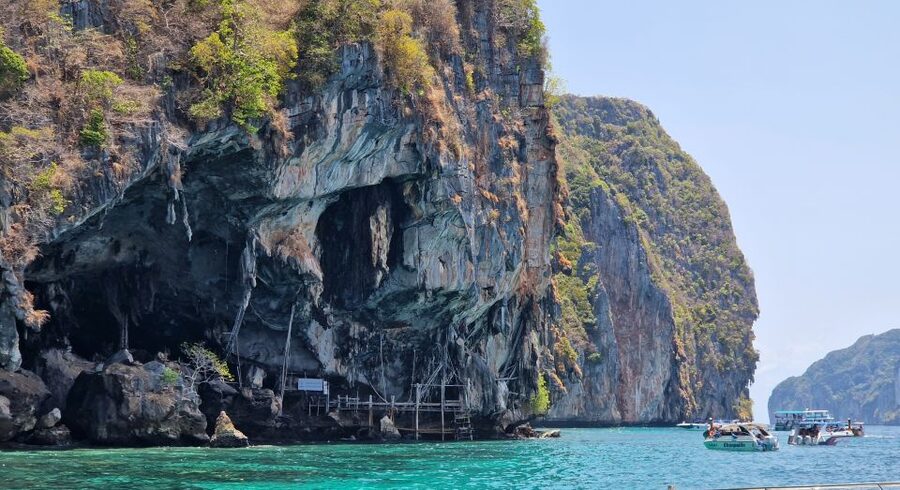 Koh Lanta: Phi Phi Islands Tour w/ Maya Bay, Snorkel & Lunch - Snorkeling near the Phi Phi cliffs