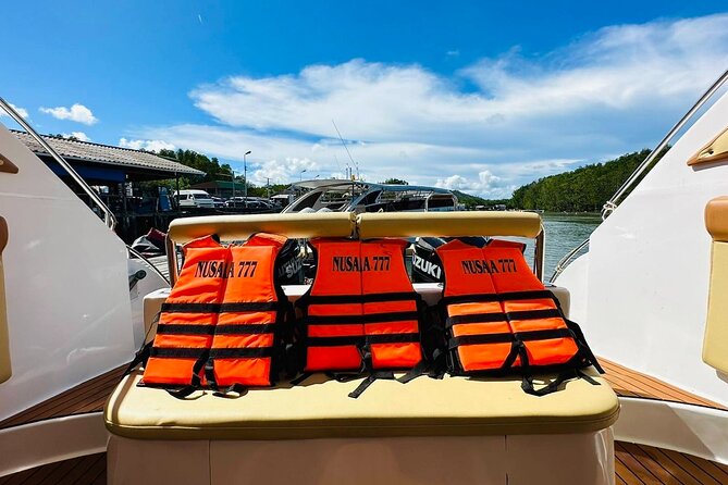 Krabi 5 Island Speedboat Tour from Phuket - Lao Lading’s small beach and steep cliffs