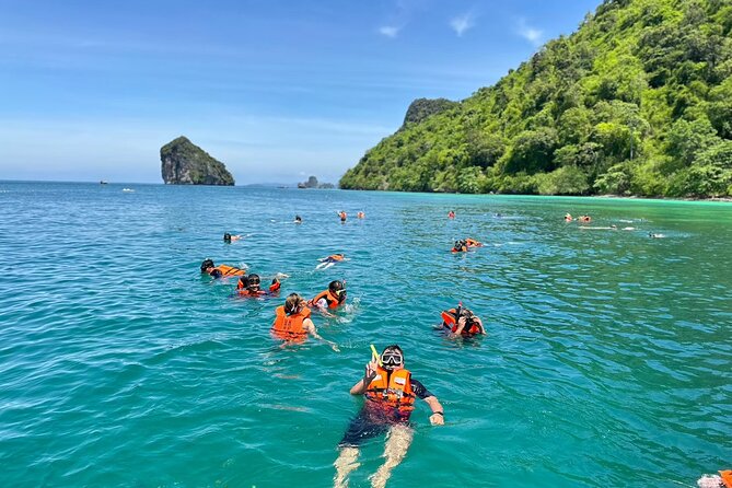 Krabi 7 Islands Snorkeling, Sunset Dinner & Plankton Night - Poda Island, sunset, and the beach barbecue