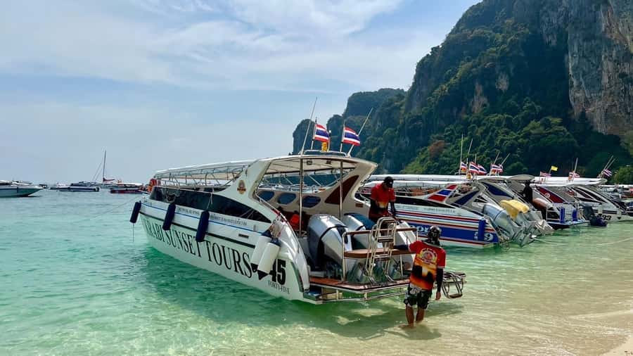 Krabi: Phi Phi & 4 Islands Sunset Tour by Speedboat - Pileh Lagoon is the clearest water stop