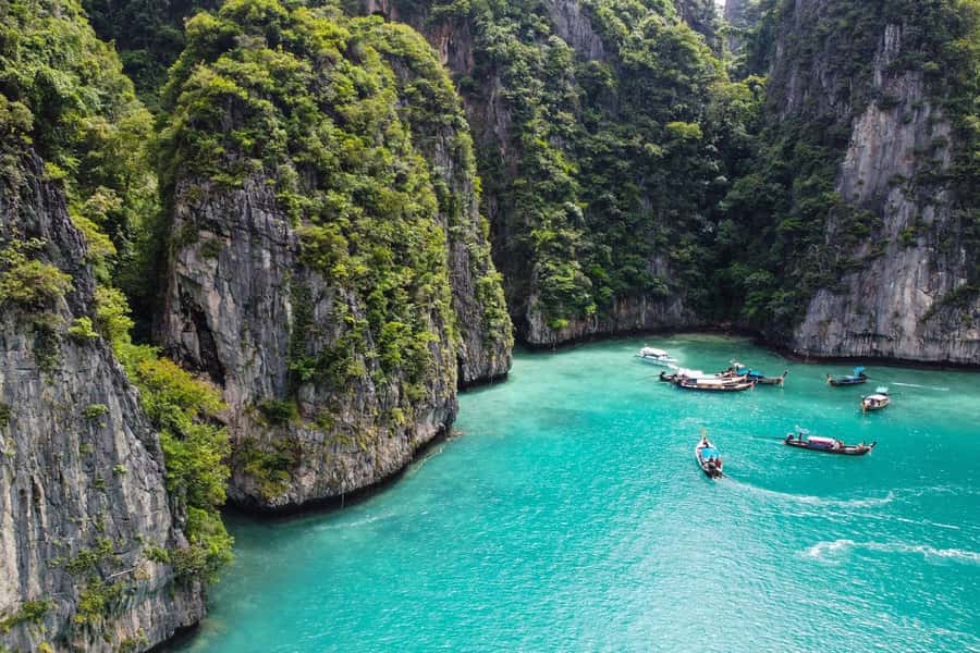 Krabi: Phi Phi Island Sunset Maya Bay and Four Islands Tour - Walking from Loh Samah Bay to Maya Bay