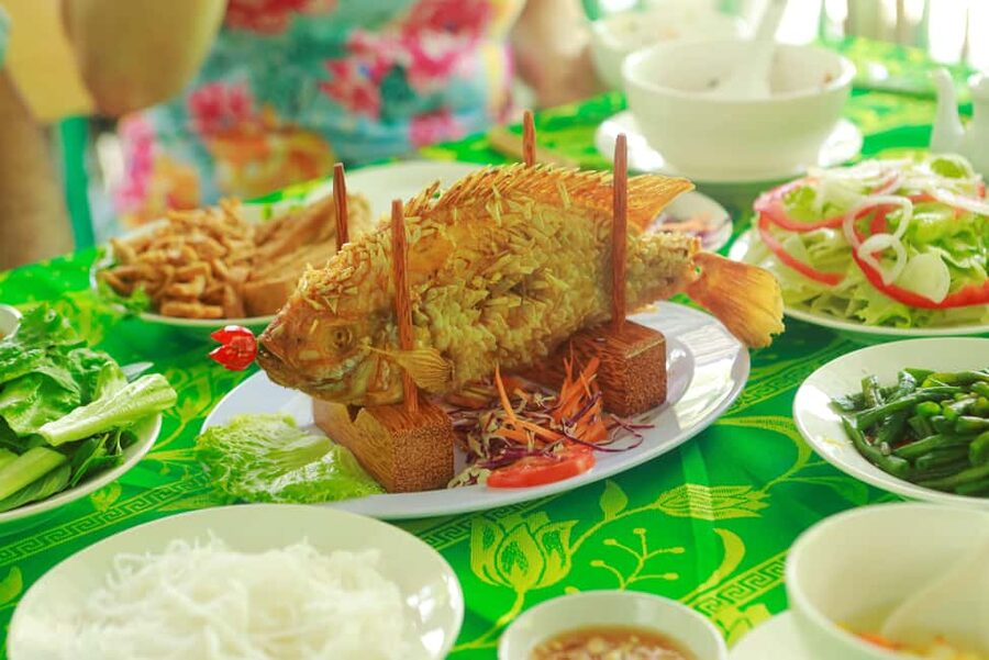 Mekong Delta Full Day - My Tho & Ben Tre - Four Islands Tour - Vinh Trang Pagoda and its 60 Buddha statues