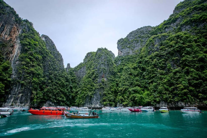 Phi Phi: 7 Island Longtail Boat Snorkeling Tour with Sunset - Pileh Lagoon is the first major swim