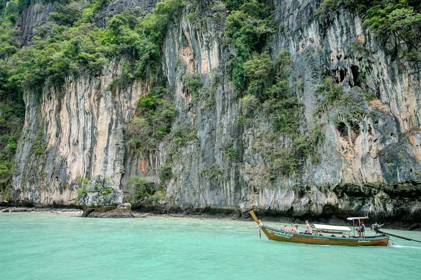 Phi Phi: 7 Island Longtail Boat Snorkeling Tour with Sunset - Shark Point rewards patient snorkelers