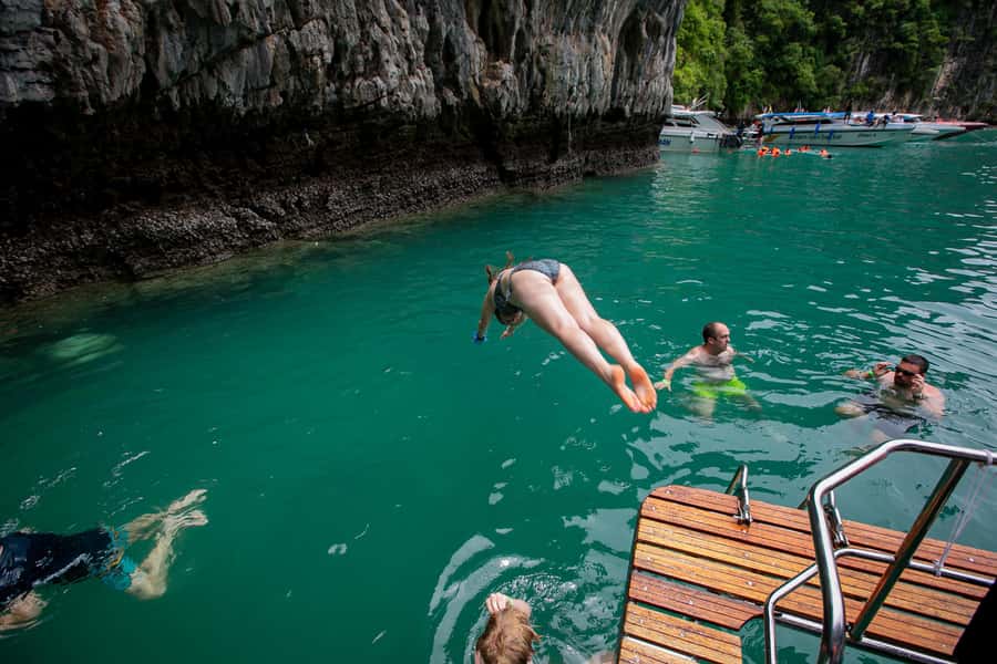 Phi Phi: 7 Islands Speed Boat Tour with Sunset and Plankton - Maya Bay Is Beautiful, Busy, and Protected