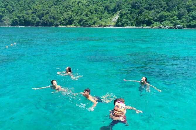 Phi Phi Island Hopping Day Trip by Speed Boat from Phuket - Pi Leh Bay beneath 100-meter cliffs