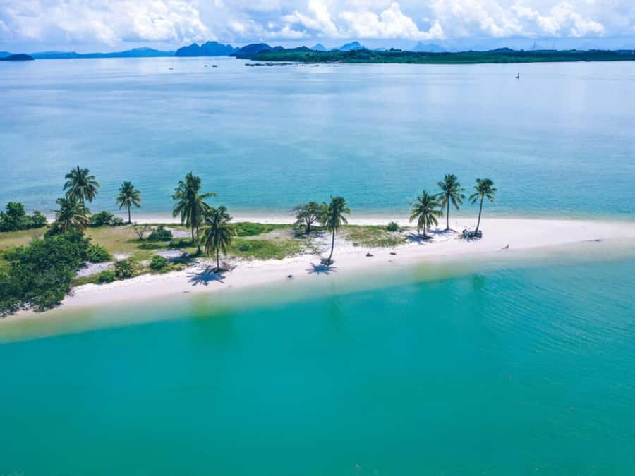 Phuket: 4 Islands Krabi Adventure & Snorkeling Day Tour - Naka Island: a final beach break with extra charges