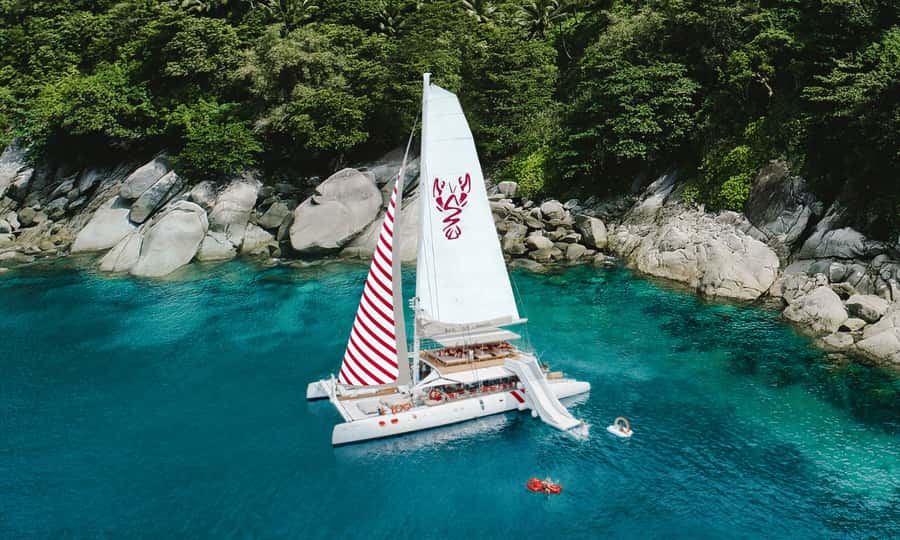 Phuket: Sailing Yacht Island Hopping & Party Full-Day Cruise - From Phuket pickup to the open water