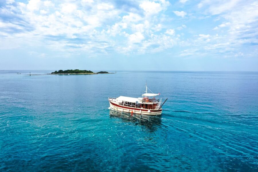 Poreč: Panoramic Morning Cruise Among 20 Islands with Drinks - A coastal look at Vrsar