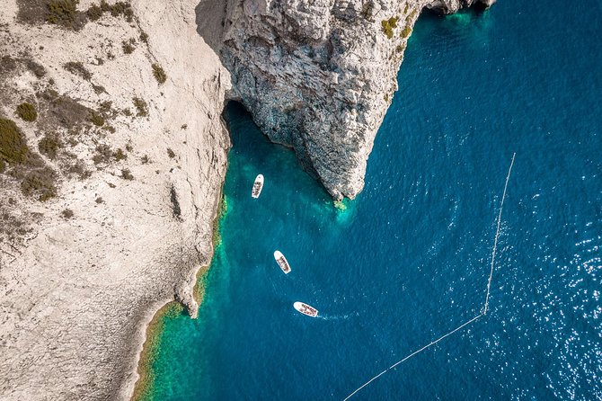 Private Blue Cave and Hvar - 5 Islands Tour - Komiza gives the morning a local pause