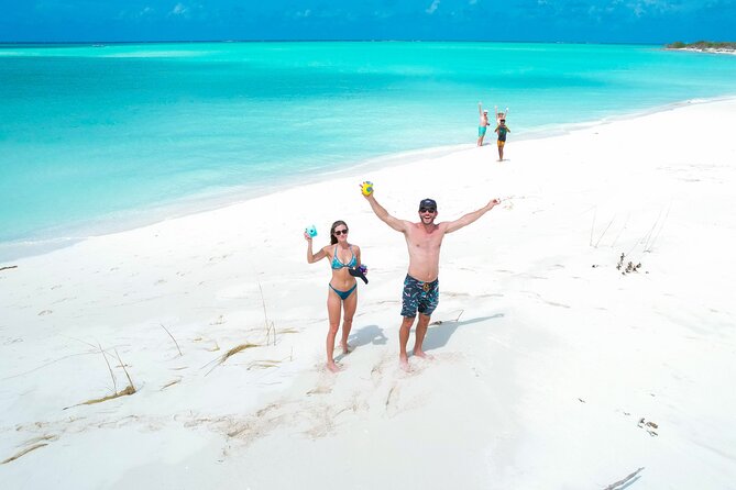 Private Boat Island Hopping & Snorkeling in Turks & Caicos 4Hrs - Little Water Cay and Half Moon Bay: beach time with rock iguanas