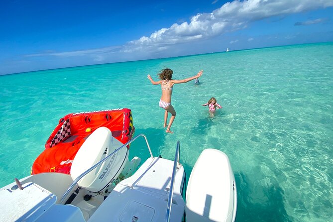 Private Boat Island Hopping & Snorkeling in Turks & Caicos 4Hrs - What the crew adds to the outing