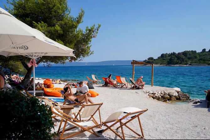 Private boat tour Blue Lagoon and 3 Islands from Trogir or Split - Beach Bar Borkko: swimming, drinks, and a separate lunch bill