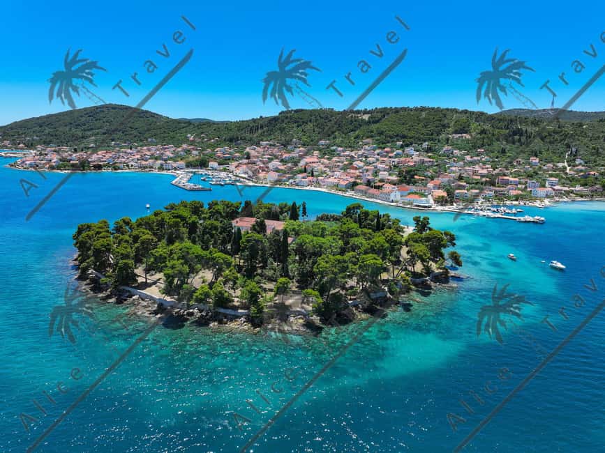Private Island Hopping Boat tour around Zadar with Drinks - The first island stop: swimming, snorkeling, and quiet water