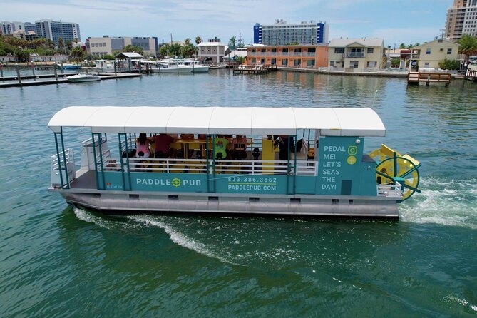 Private Party Boat to Island Hop, Dolphin Watch, and Swim - Passing Under Sand Key Bridge